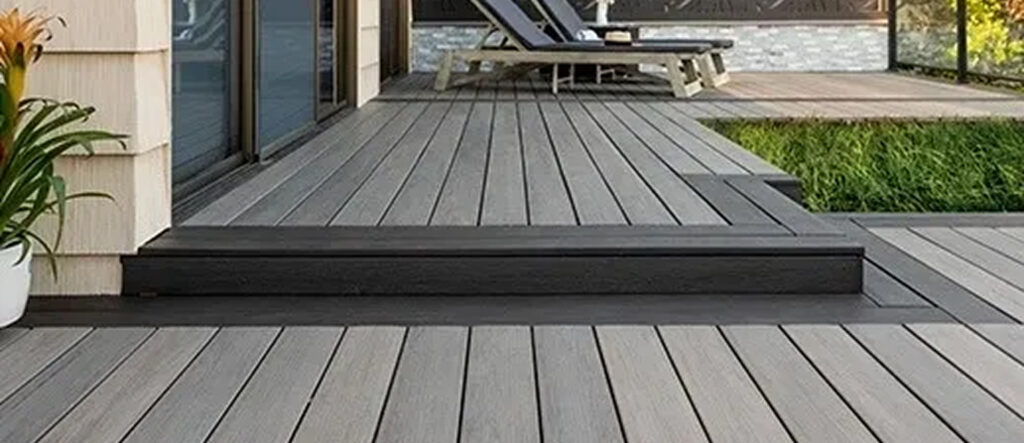 Modern grey composite decking with clean lines and steps.